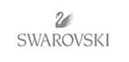 Logo von Swarovski mit einem Schwanenmotiv in grauer Schrift.